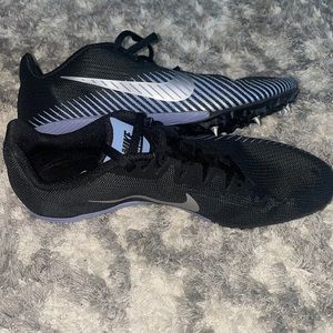 Nike black and blue spikes